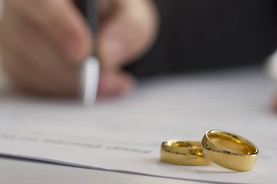 Hands Of Wife, Husband Signing Decree Of Divorce, Dissolution, C