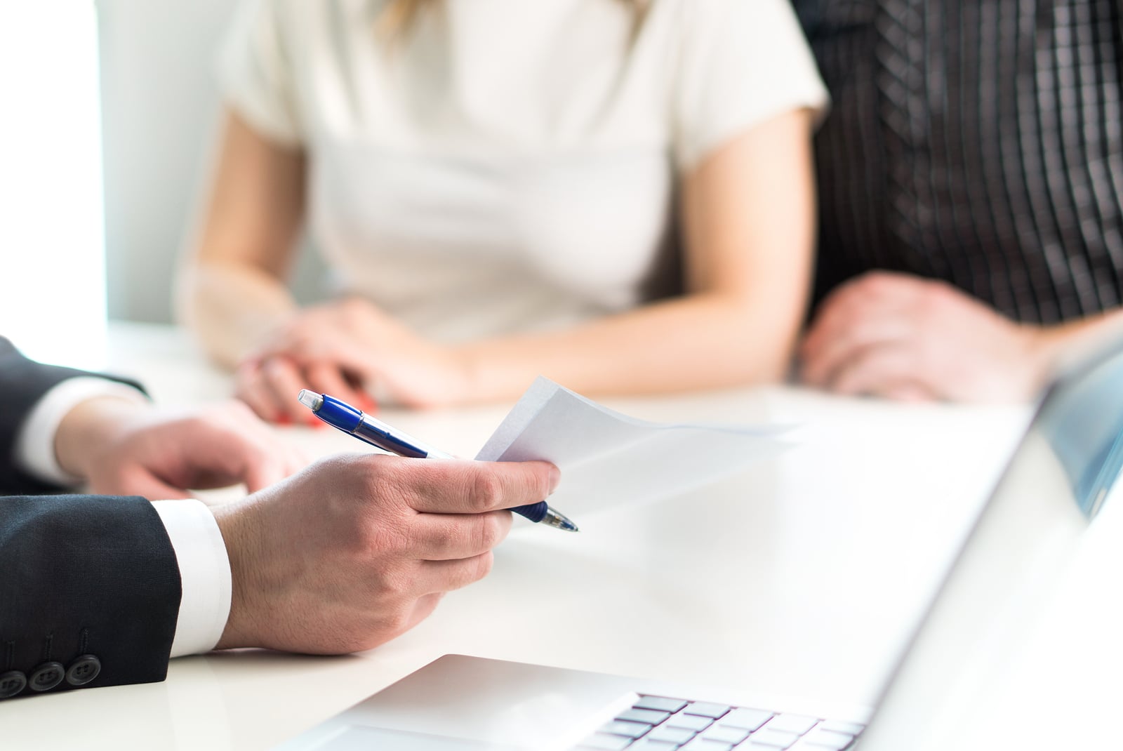Couple Having Meeting With Legal Advisor, Real Estate Agent, Bus