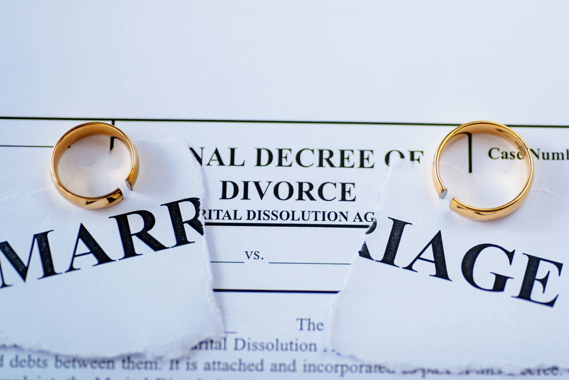 bigstock-Divorce-Decree-And-Two-Broken–264610165