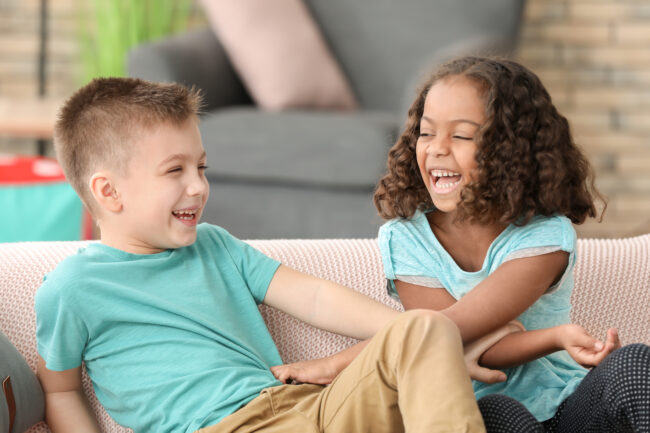 Cute children playing indoors. Child adoption