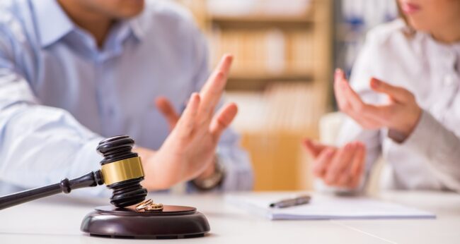 Judge gavel deciding on marriage divorce