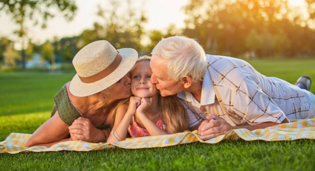 grandparents-kissing-granddauther-2021-09-01-14-47-40-utc