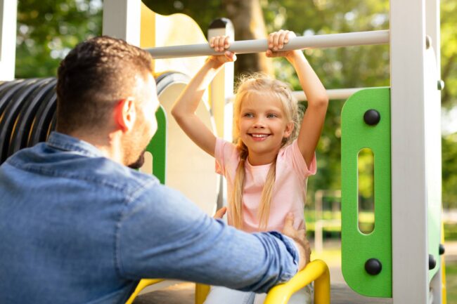 tales-from-the-playground-father-playing-with-his-2023-07-25-19-31-44-utc